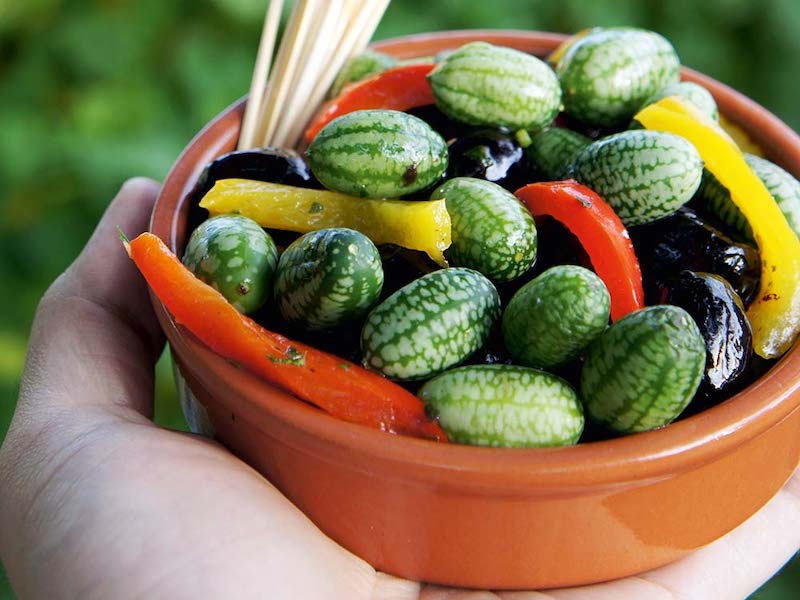 Cucamelons in bowl with peppers