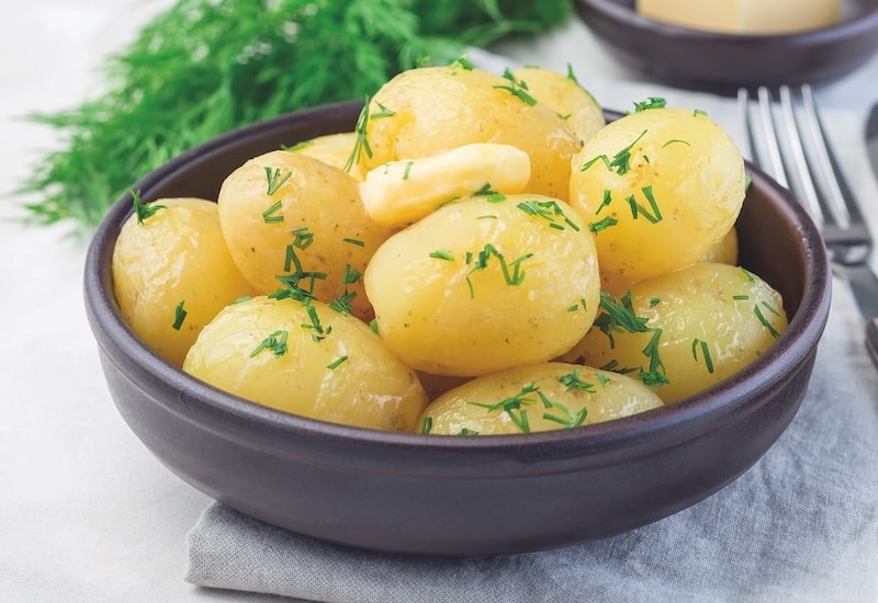 Potatoes in bowl with butter