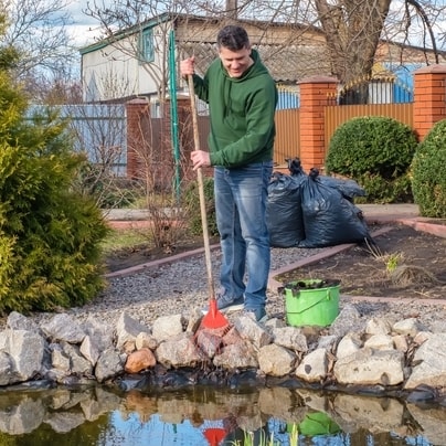 Clearing pond of blanket weed - In your garden in June