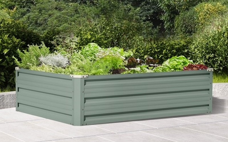 Green raised metal garden bed