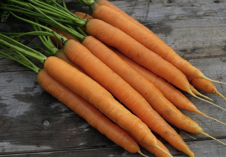 Bright orange carrots table