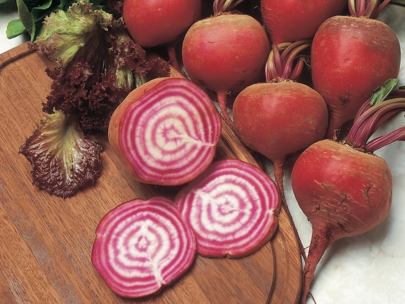 Striped beetroot on wooden table